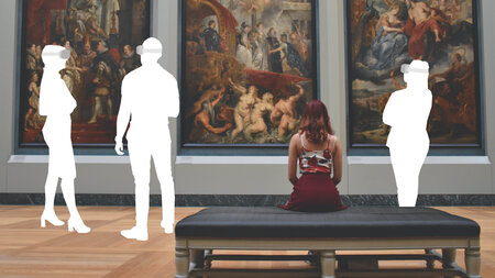 People standing in an art exhibition. 